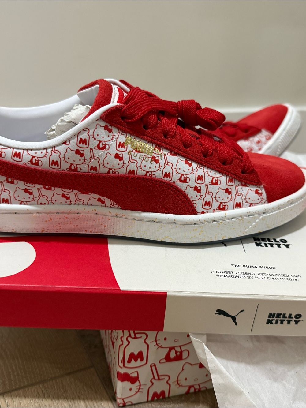 Vans Red and White Hello Kitty Low-Top Sneakers